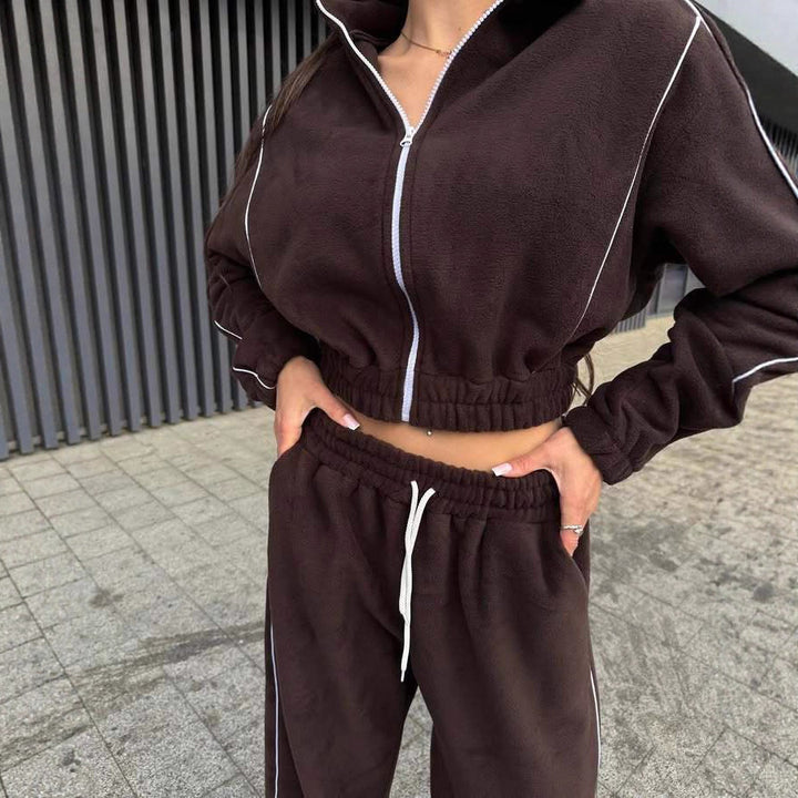 Kvinnelig fleece treningsdrakt med høy krage og elastisk midjebånd Skjora