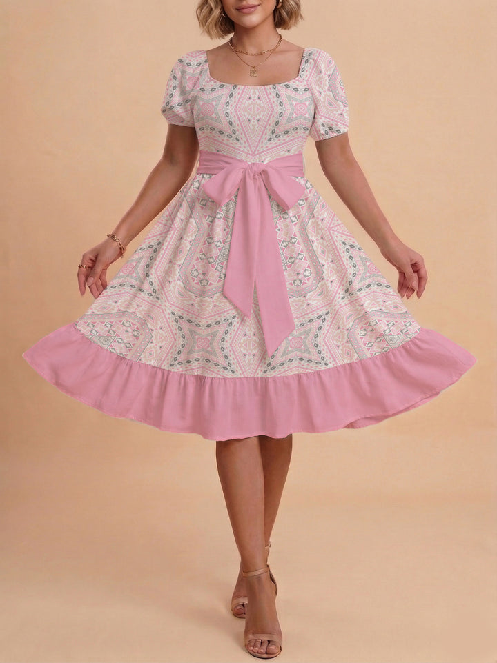 Damen modernes Blumenkleid mit elegantem Taillengürtel und asymmetrischem Saum Skjora