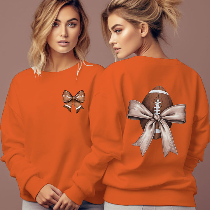Dame sweatshirt med søtt fotballmotiv og sløyfeakcent Skjora