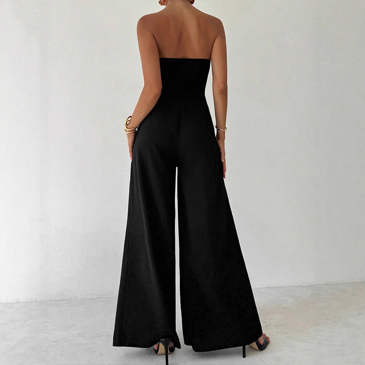 Dame Elegant jumpsuit med asymmetrisk utskjæring og dekorative knapper Skjora