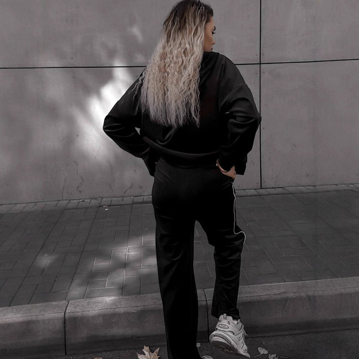 Kvinnelig sporty-elegant fleece joggedress med glidelås Skjora