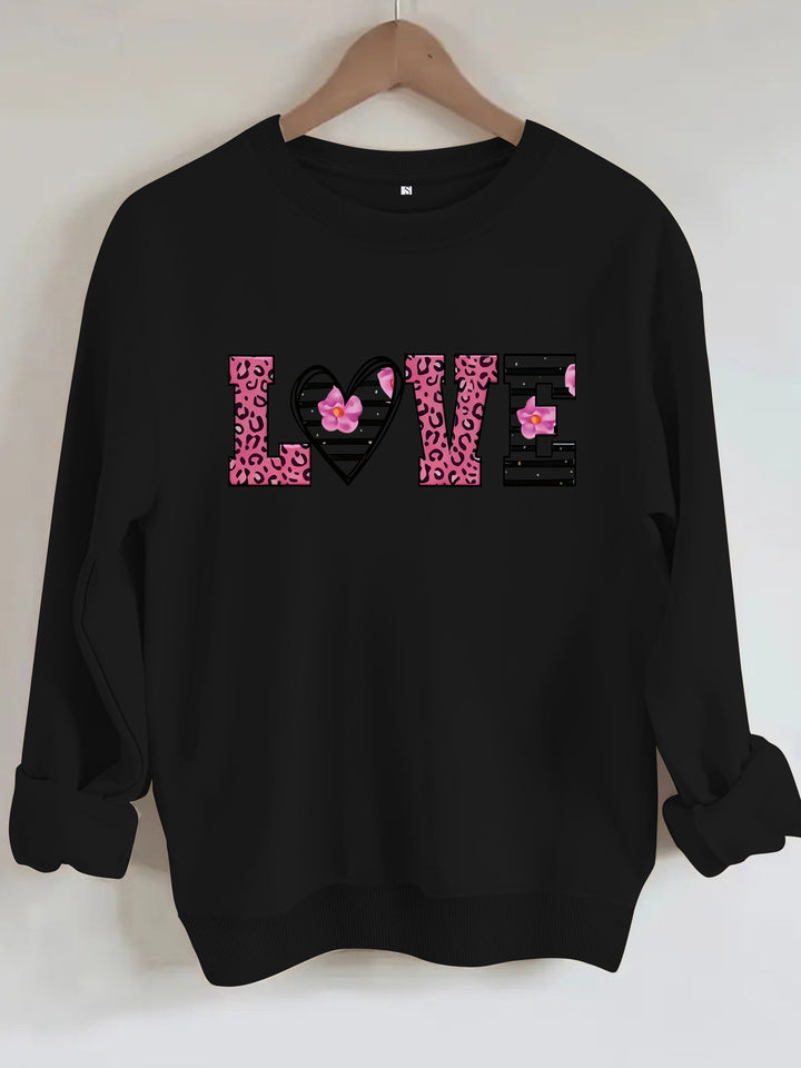 Dame sweatshirt med moderne leopard hjerte-design og behagelig passform Skjora