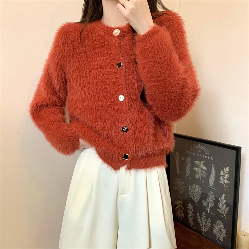 Kvinnelig koselig cardigan med knappe-design og elegant preg Skjora
