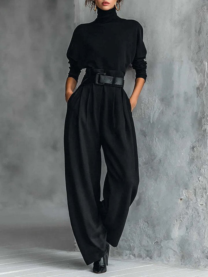 Kvinne bruks jumpsuit med høy krage og midjebelte Skjora