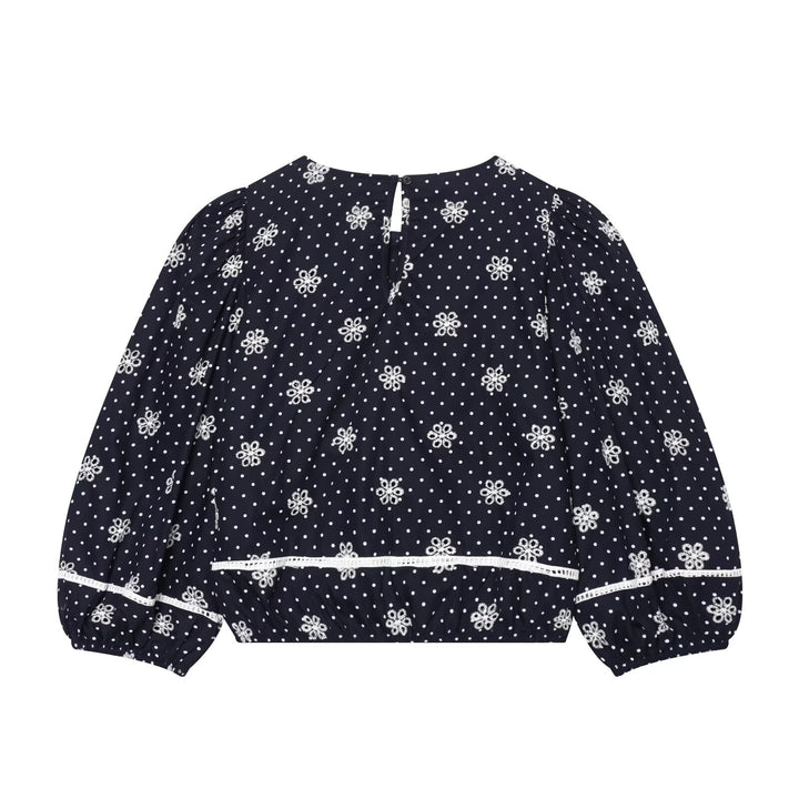Damebluse med fine spiss- og volangdetaljer Skjora