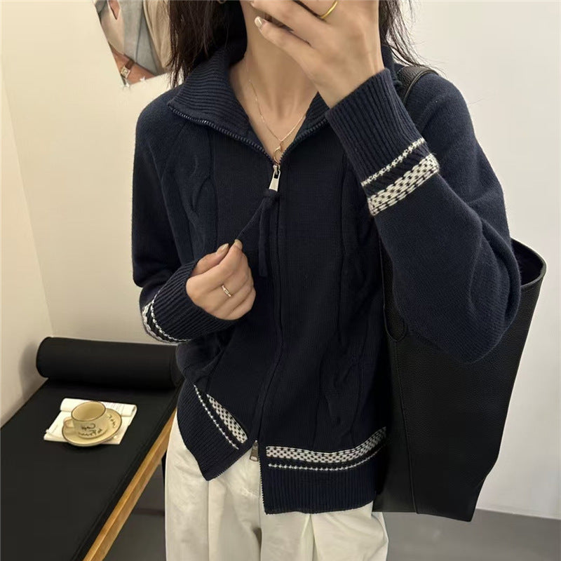 Kvinne cardigan med elegant glidelås og teksturert kabelmønster Skjora