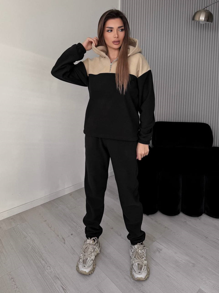 Kvinnors avslappnade fleece sportset med huva och modern passform Skjora
