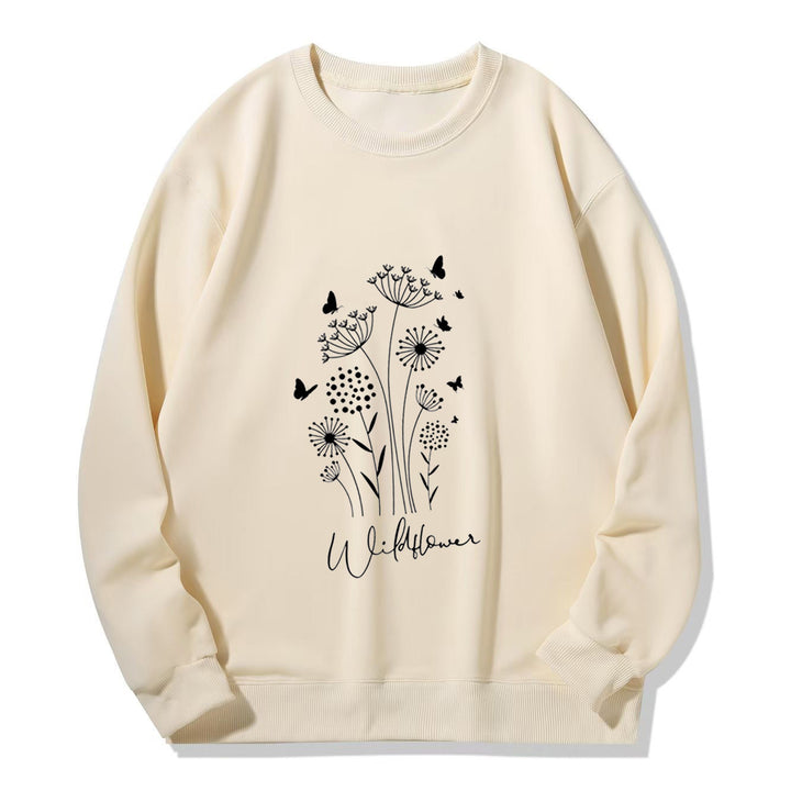 Kvinnelig sweatshirt med blomstertrykk av villblomster og koselig innerfor Skjora
