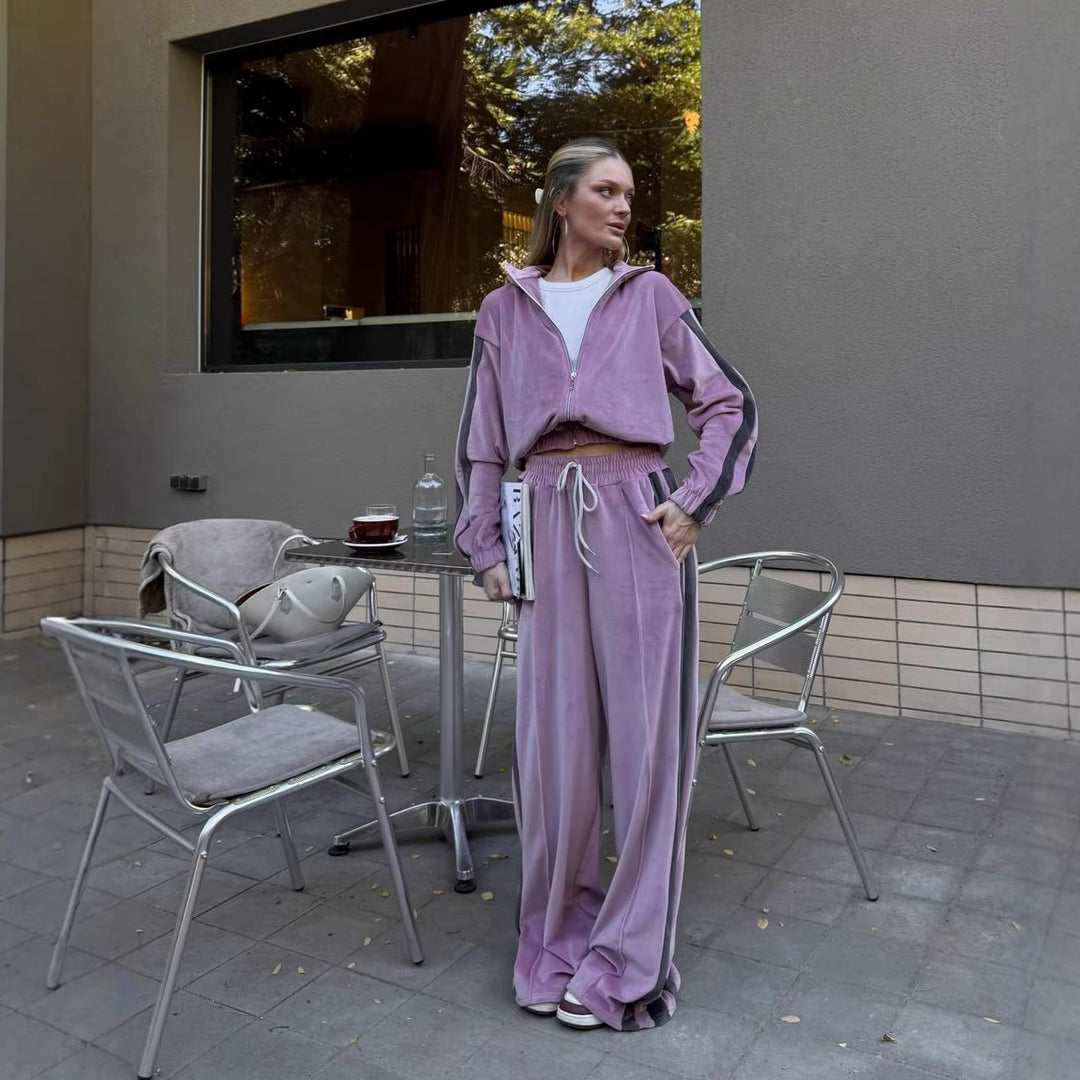 Kvinnesporty velour treningsdrakt med hevet krage og elastisk midje