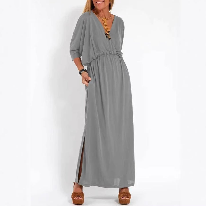 Kvinne elegant maxi kjole med sidesplit og fleksibel midje Skjora