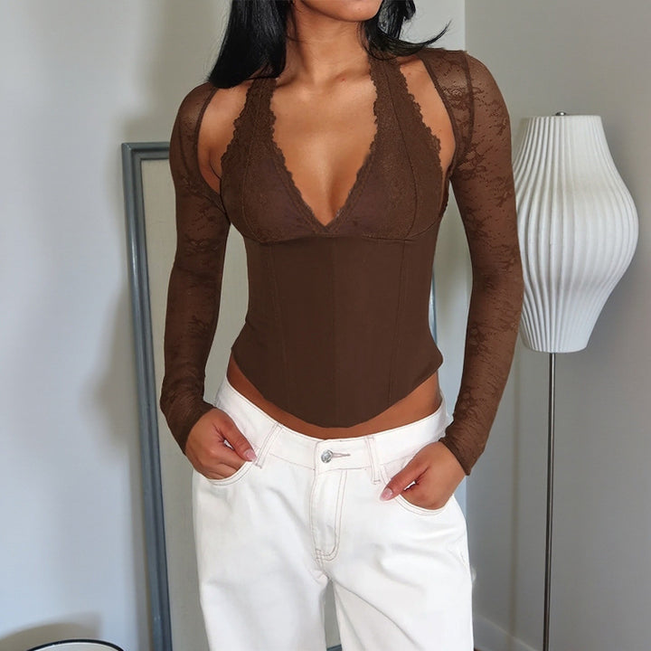 Dame elegant body med spissdetaljer og dyp V-hals Skjora