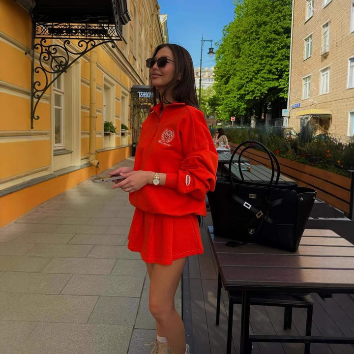 Dame sporty zip genser med avslappet snitt og broderi Skjora