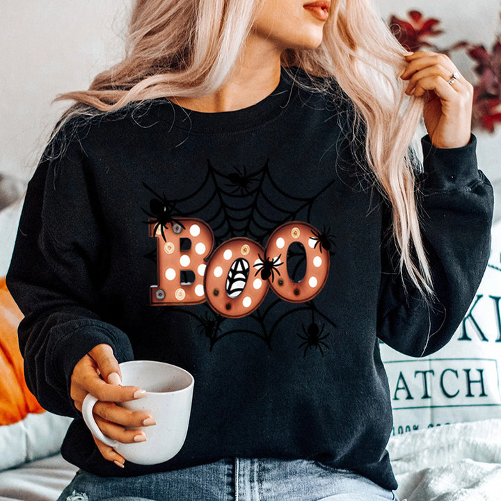 Damegenser med kreativ Halloween edderkoppnett-design Skjora