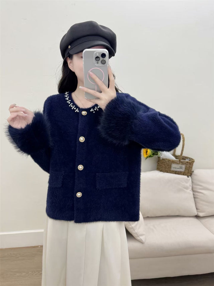 Damer elegant cardigan med perledekorasjon og fluffy ermer Skjora