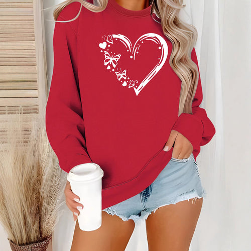 Dame sweatshirt med kreativt hjerte- og sommerfugl-design Skjora