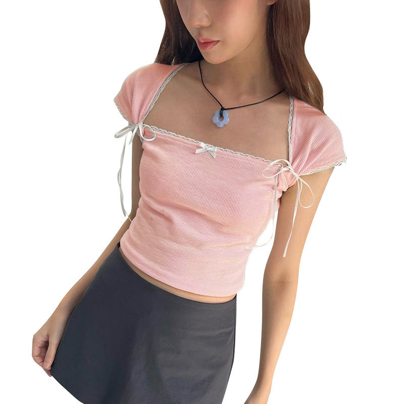 Dame Crop-top med justerbare spaghetti-stropper og elegante knute-detaljer Skjora