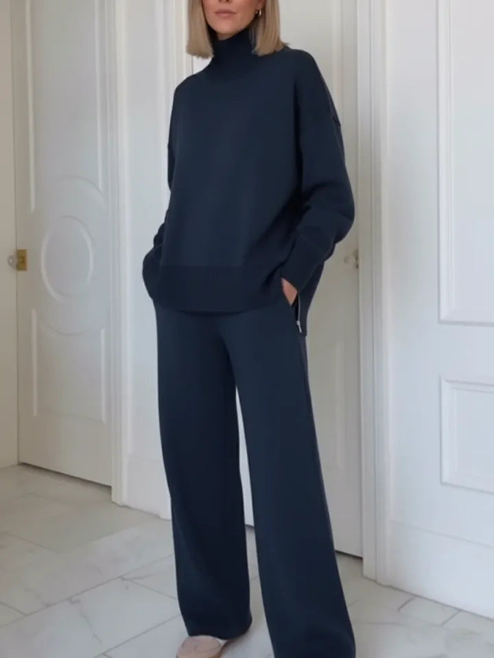 Kvinnelig komfortabel strikket loungewear-sett med høye halsgenser og vide bukser Skjora