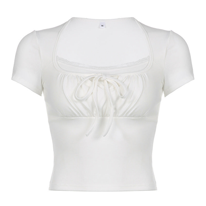 Dame figurert overdel med rynket design og blonde detaljer Skjora