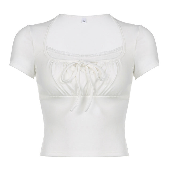 Dame figurert overdel med rynket design og blonde detaljer Skjora