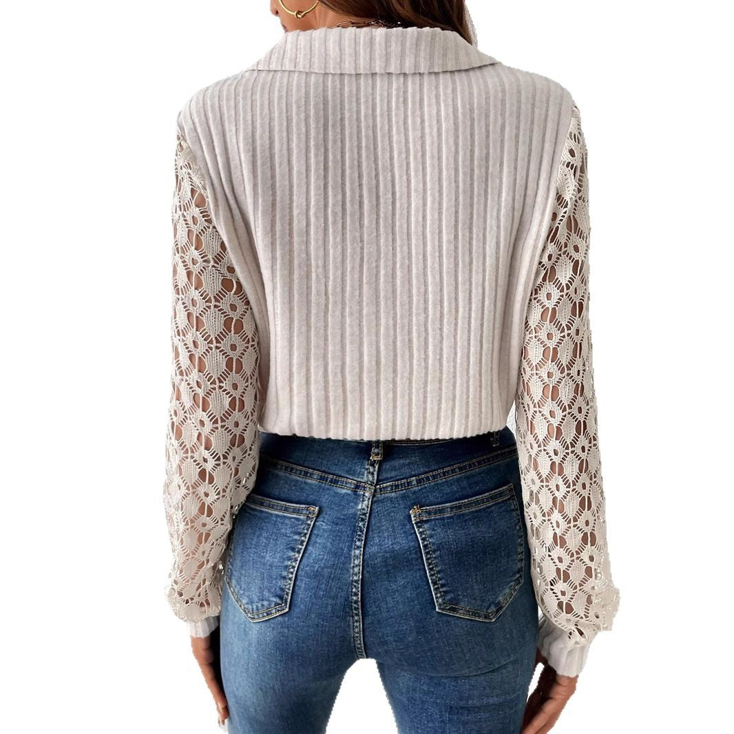 Kvinnes V-hals bluse med blonde ermer og ribbet tekstur Skjora