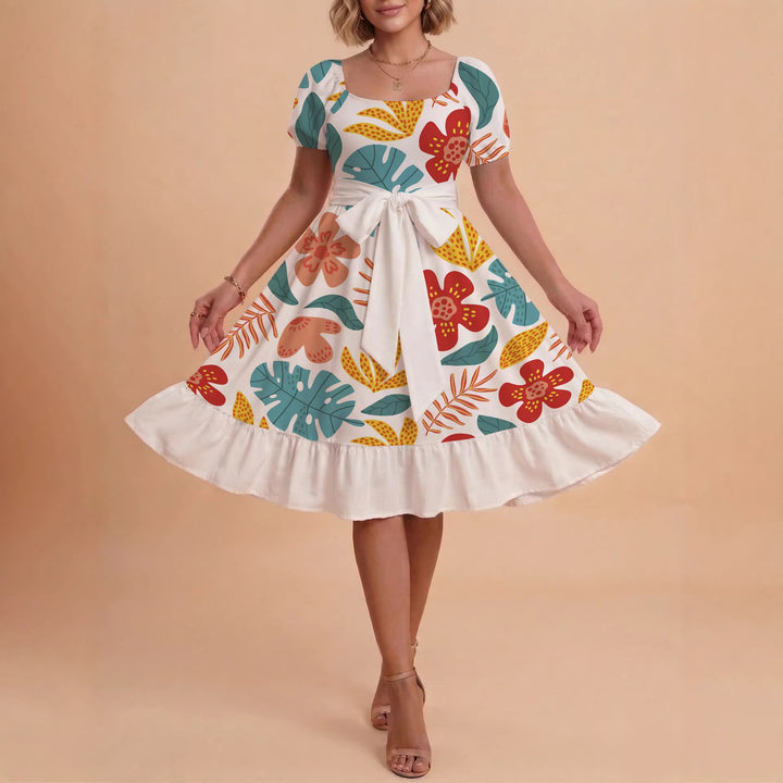 Damen Sommerliches Blumenkleid mit taillierbarem Gürtel und voluminösen Ärmeln Skjora