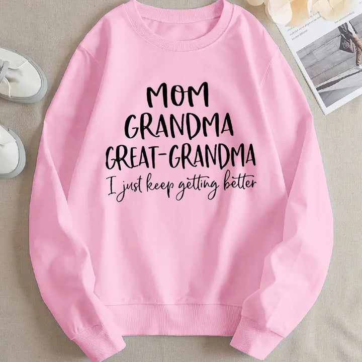 Dame sweatshirt med kreativ familieprint og komfortabel passform Skjora