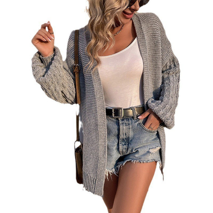 Damer chunky strikk cardigan med åpne fronter og stilige kabelmønstre Skjora