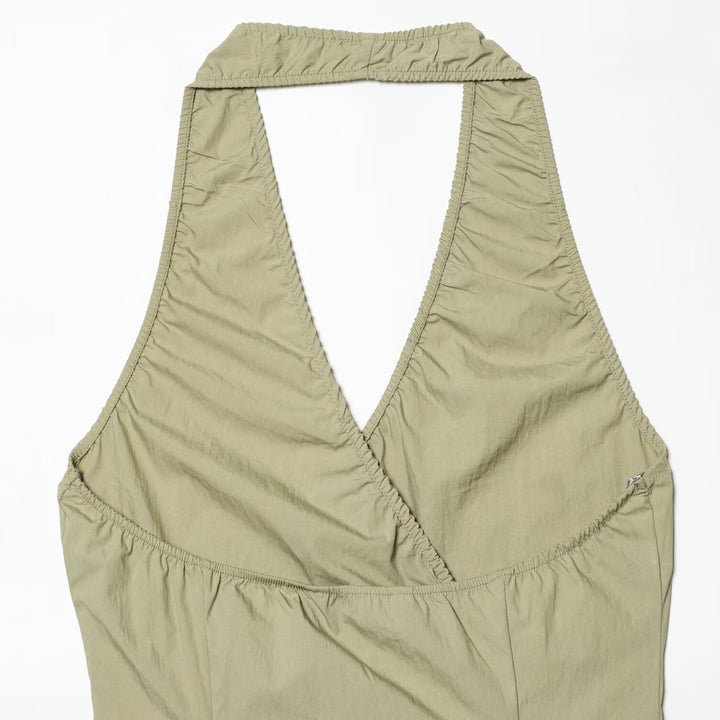 Dame Halterneck Top med elegant knute-detalj og flytende snitt Skjora