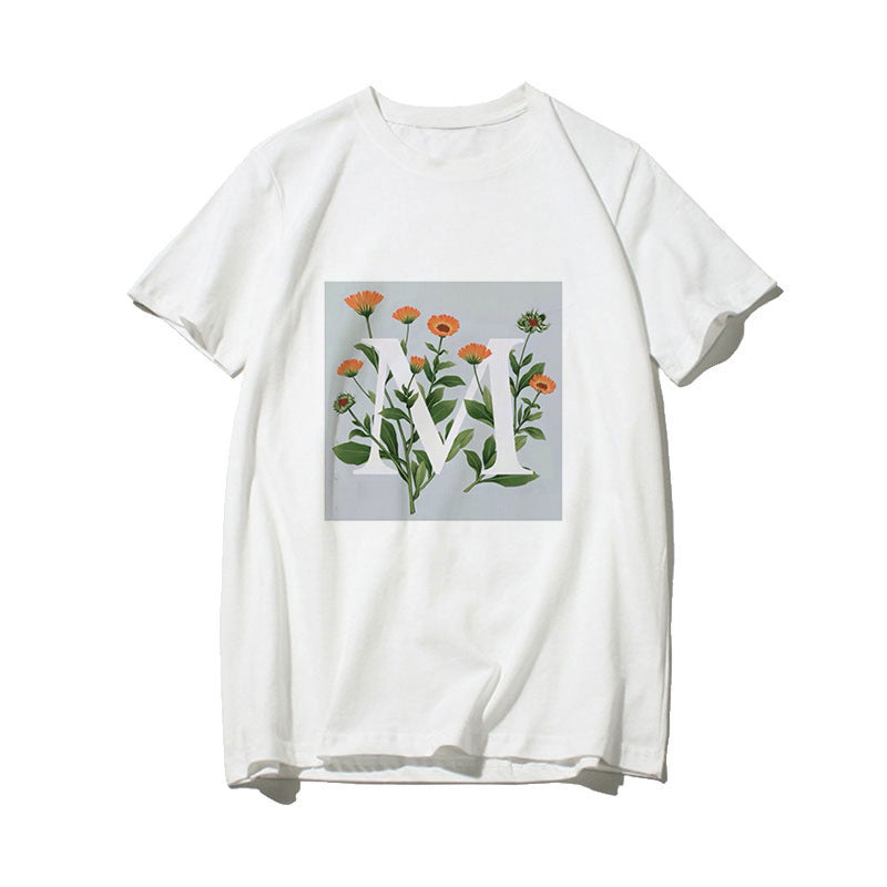 Dame T-skjorte med blomsterdesign og kreativt trykk Skjora
