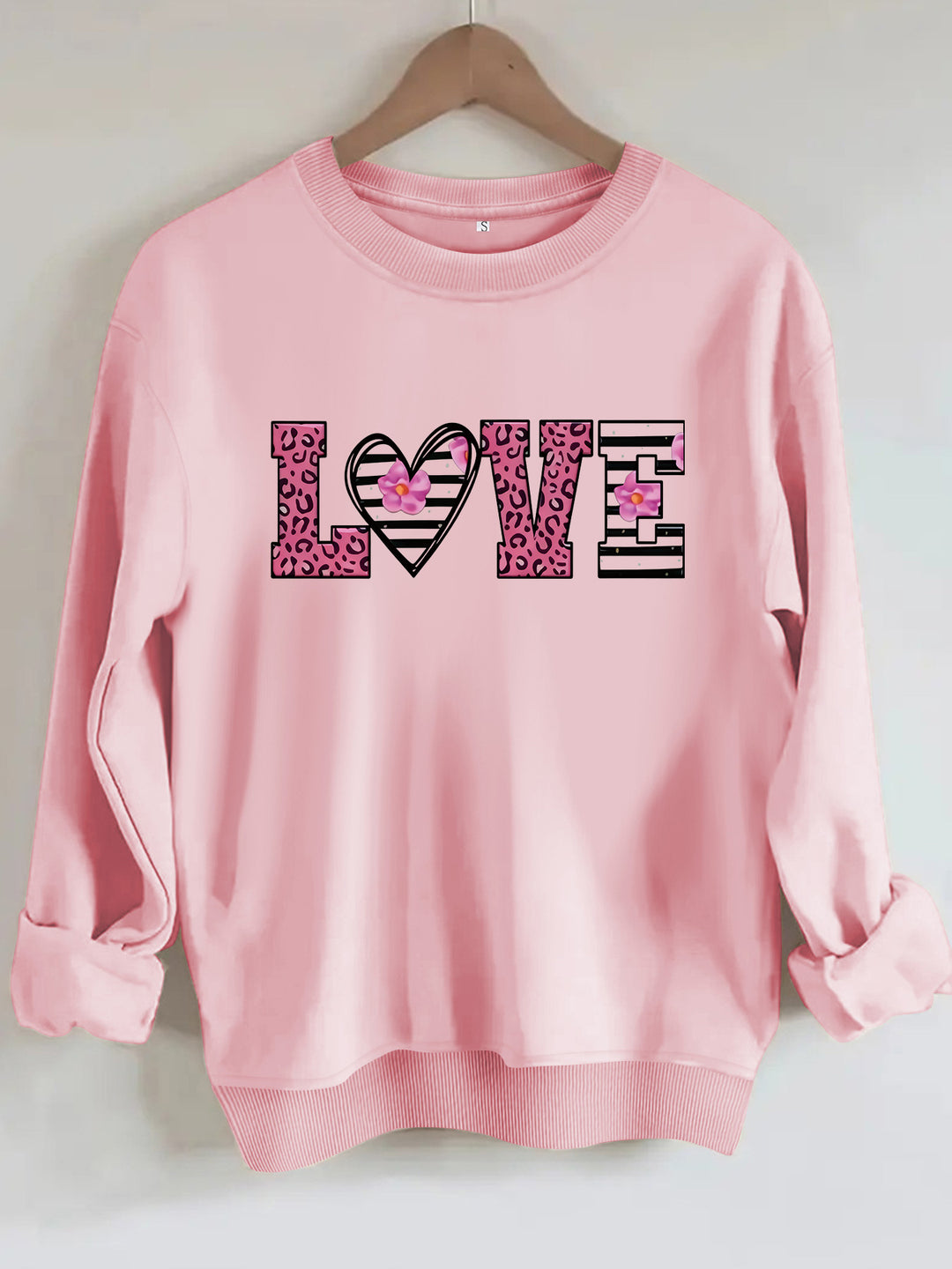 Dame sweatshirt med moderne leopard hjerte-design og behagelig passform Skjora