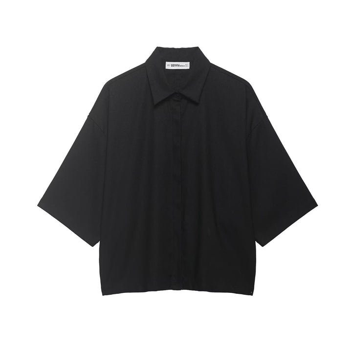 Dame oversized-bluse med moderne snitt og praktiske knappdetaljer Skjora
