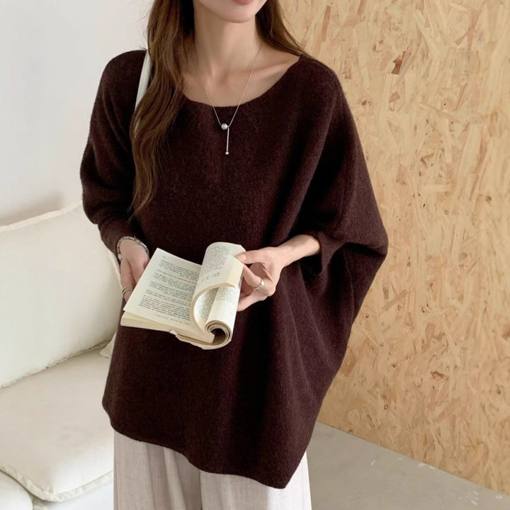 Dame oversized strikkegenser med en avslappet fasong og dramatiske ermer Skjora
