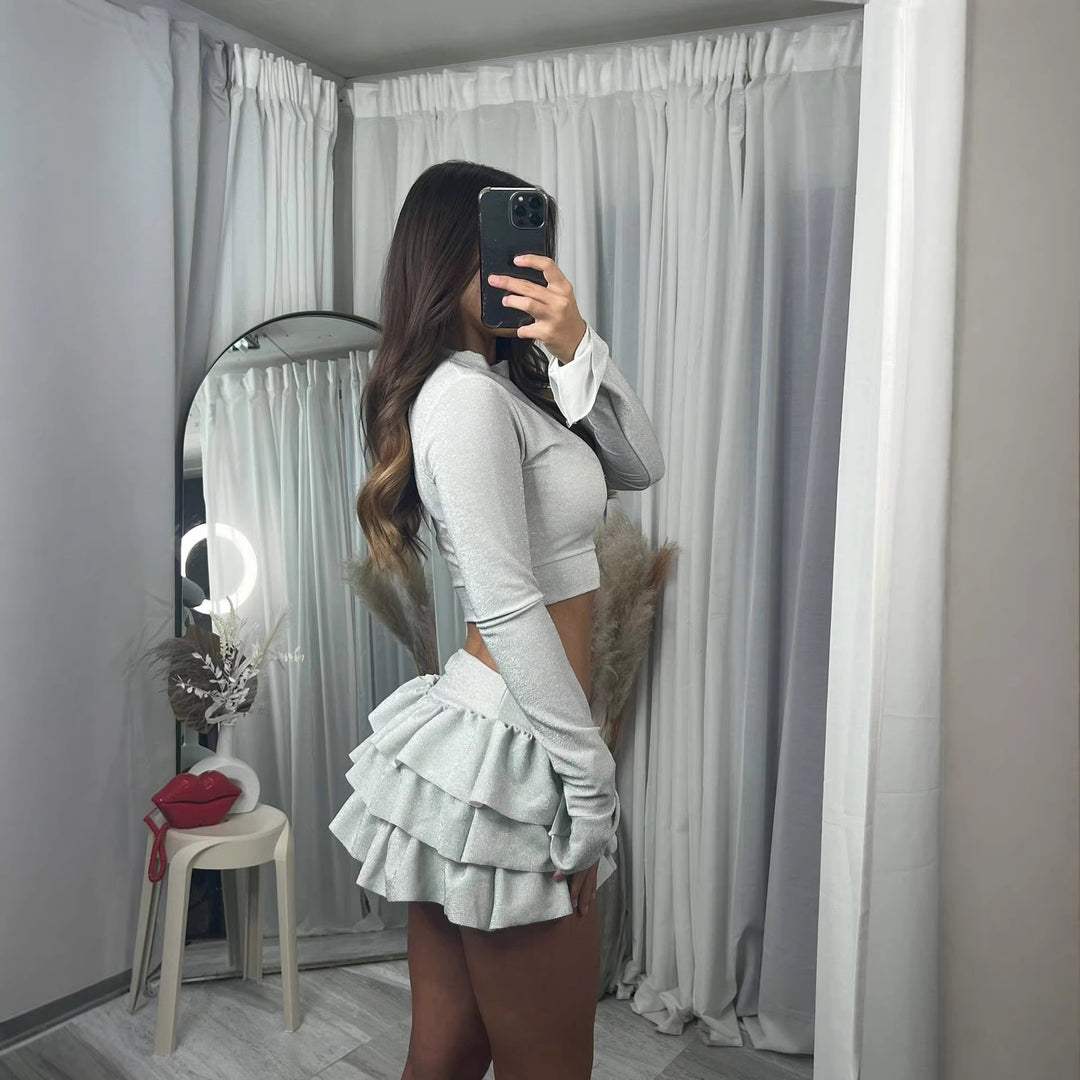 Kvinnenes moteriktige crop top og plisserte mini skjørt sett Skjora