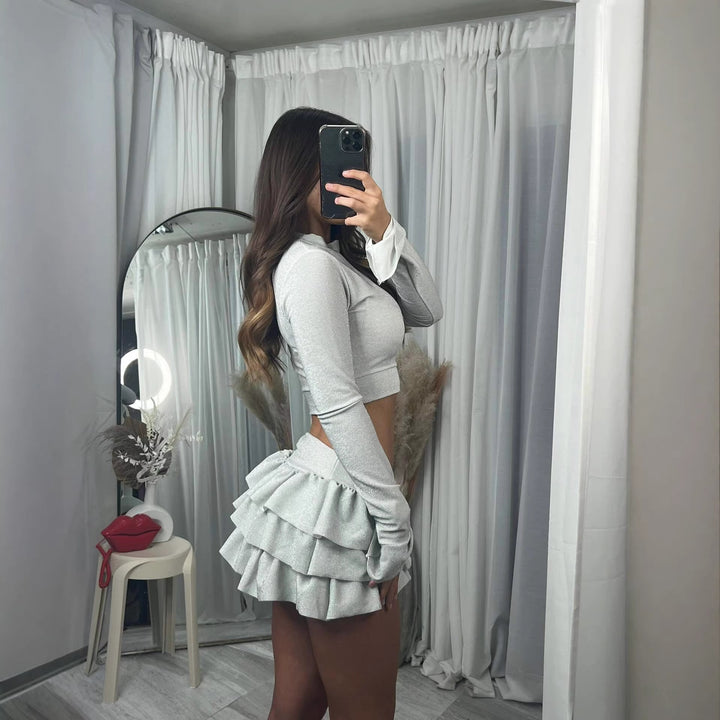 Kvinnenes moteriktige crop top og plisserte mini skjørt sett Skjora