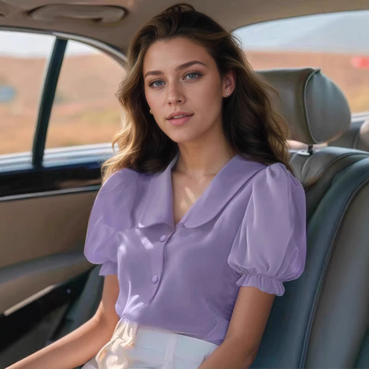 Damer Lekre skjærte bluse med pufferm og knappdetaljer Skjora