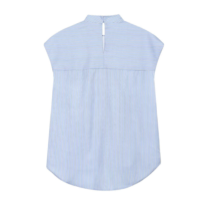 Damebluse med moderne snitt og unikt knytekrål Skjora