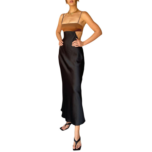 Damer elegant lang kjole med innovativt cut-out design og delikate spaghetti-stropper Skjora