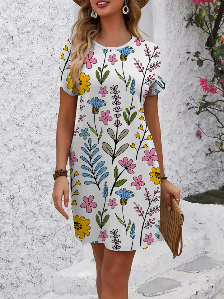 Dame uformell T-skjortekjole med fargerikt blomsterdesign og behagelig passform Skjora