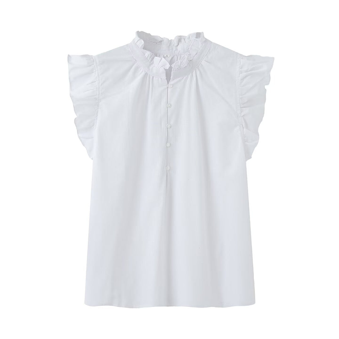 Damebluse med rysjer og knappestolpe Skjora