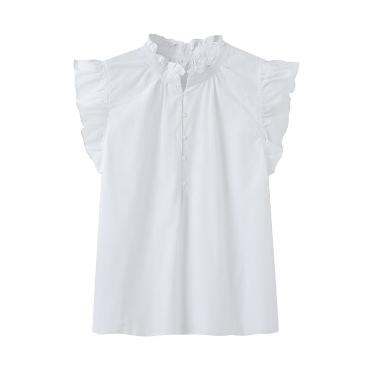 Damebluse med rysjer og knappestolpe Skjora