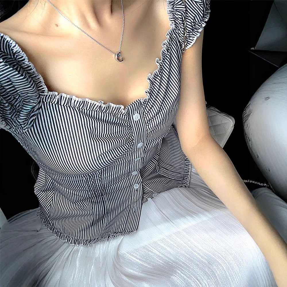 Dame Off-Shoulder Bluse med fine ruffle-detaljer og stripete mønster Skjora