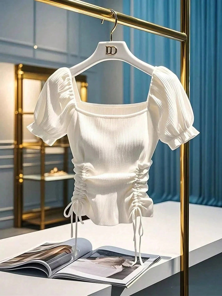Dame lett ribbestrikket crop top med justerbar snøring Skjora