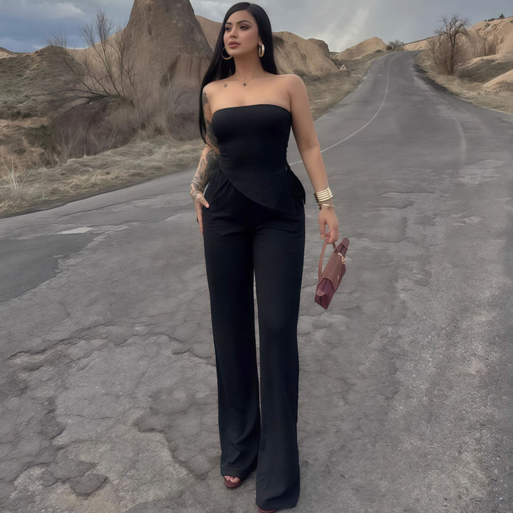 Dame elegant jumpsuit med off-shoulder design og asymmetrisk hem Skjora