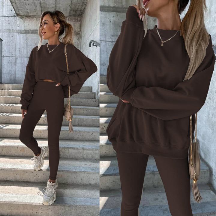 Damesporty fritidssett med casual oversized genser og tettsittende tights Skjora