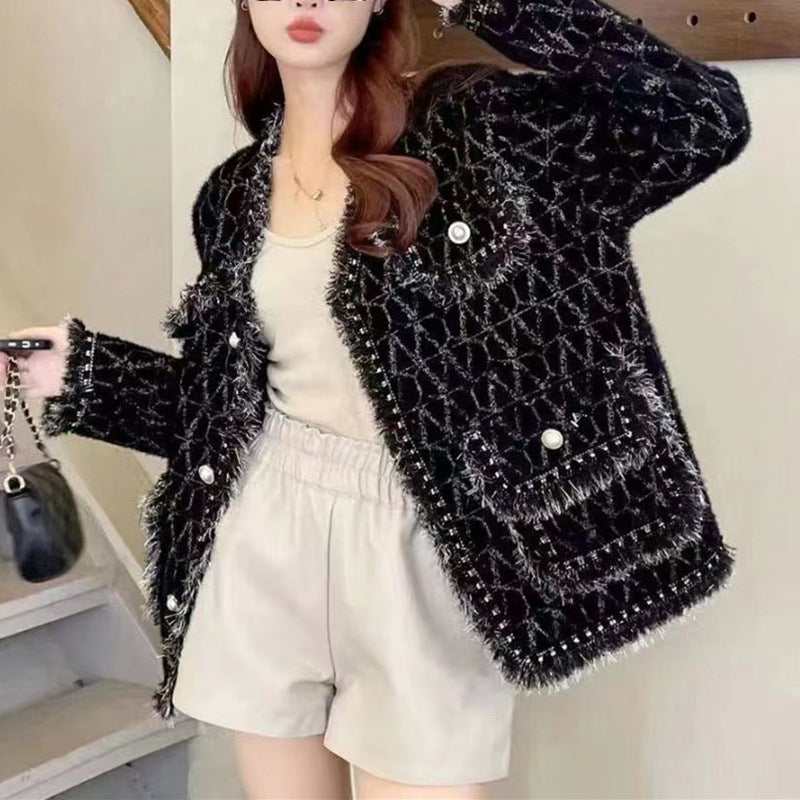 Kvinne Fluffy Cardigan med elegante knappdetaljer og dekorativ kant Skjora