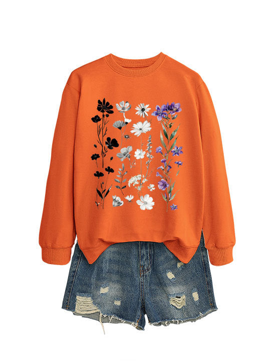 Dame sweatshirt med blomster grafisk design og myk innvendig fôr Skjora