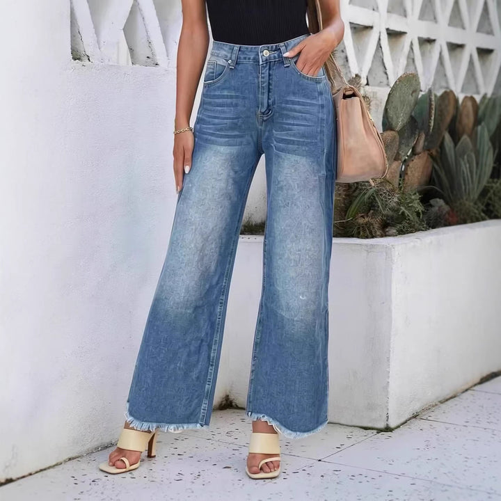 Dame vidde denim-jeans med kreativt mønster og frynset kant Skjora