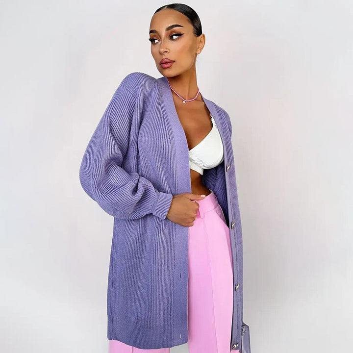 Kvinnens strikket frakk med oversized snitt og elegante knappedetaljer Skjora