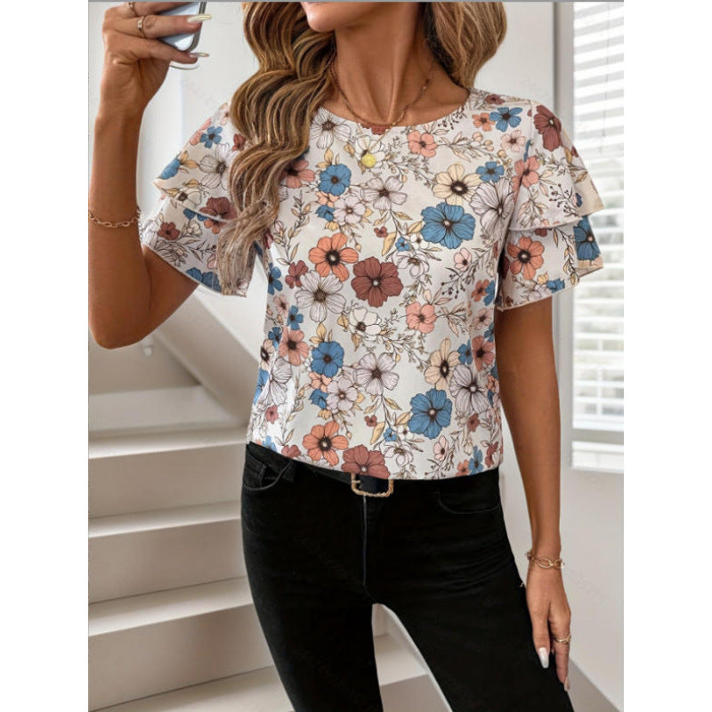 Damer kortermet bluse med volang og blomsterdesign Skjora