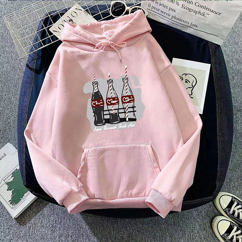 Damen Kapuzenpullover mit verspieltem Coca-Cola-Flaschen-Motiv Skjora